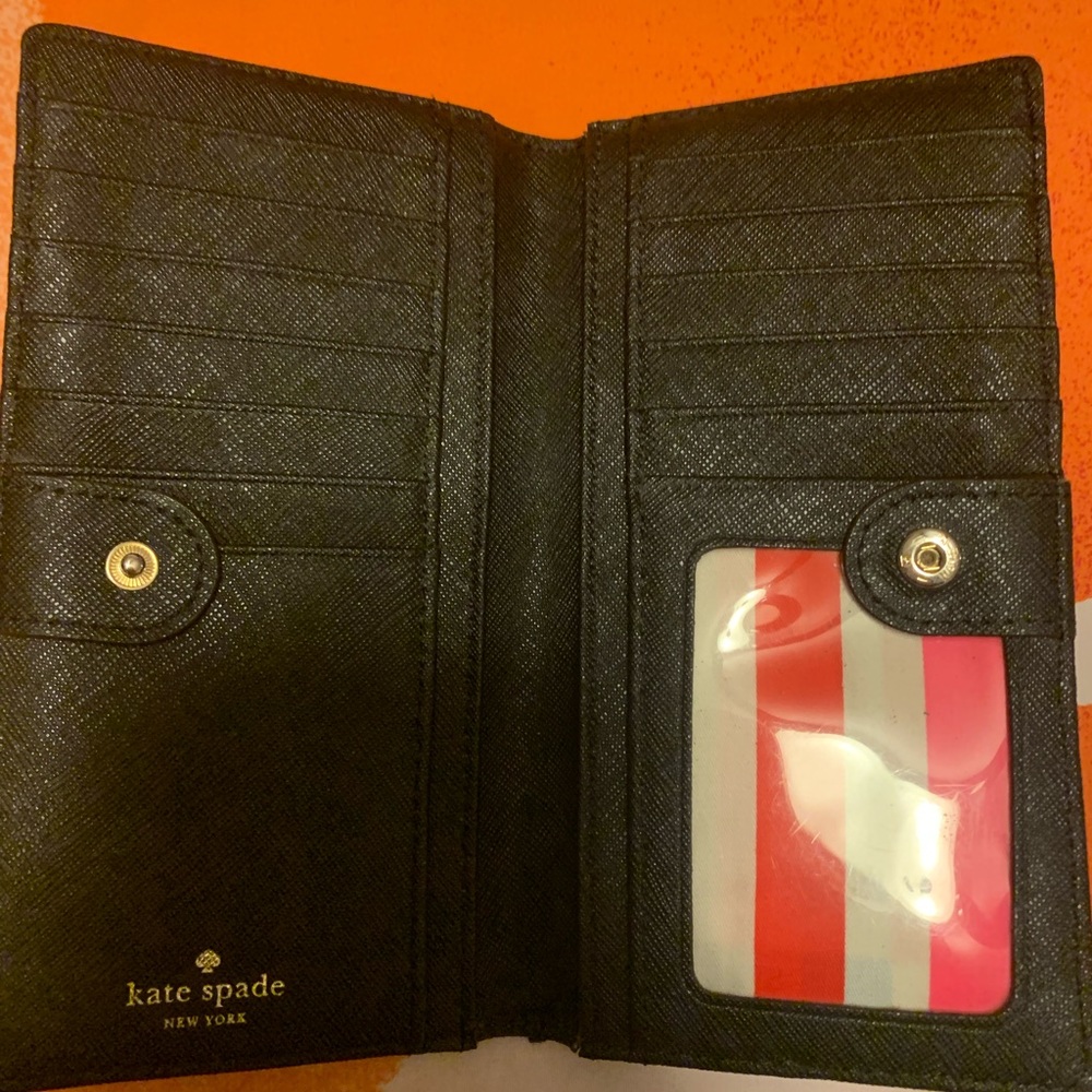Brand new. Kate spade wallet.